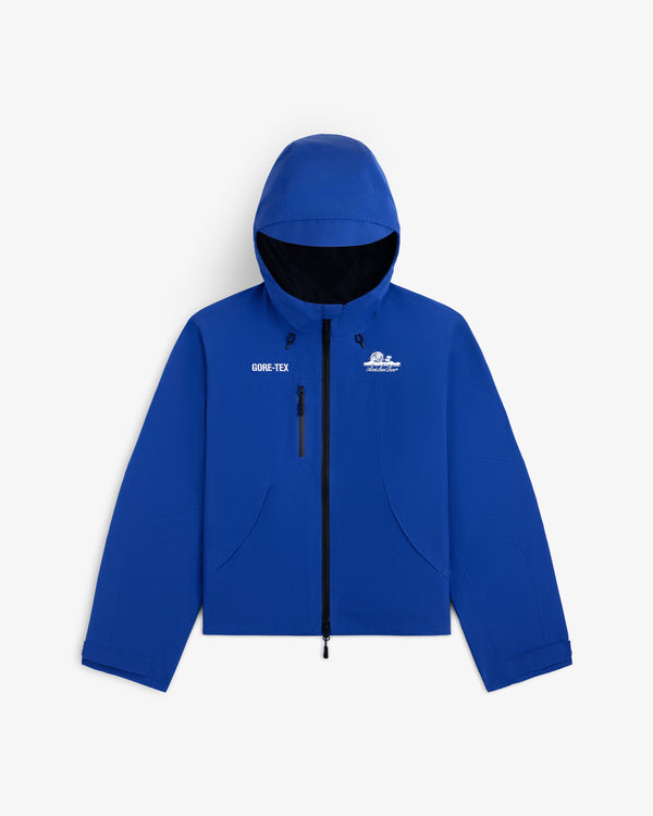 Blue Cropped GORE-TEX Shell Jacket with a hood, zipper closure, and chest graphic.