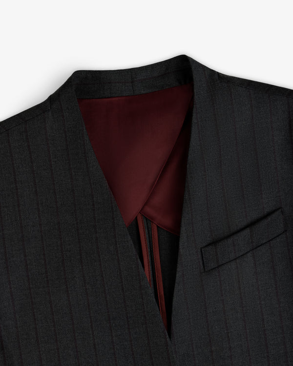 Collarless Striped Blazer in dark gray pinstripe with a deep V-neck and a maroon inner lining.
