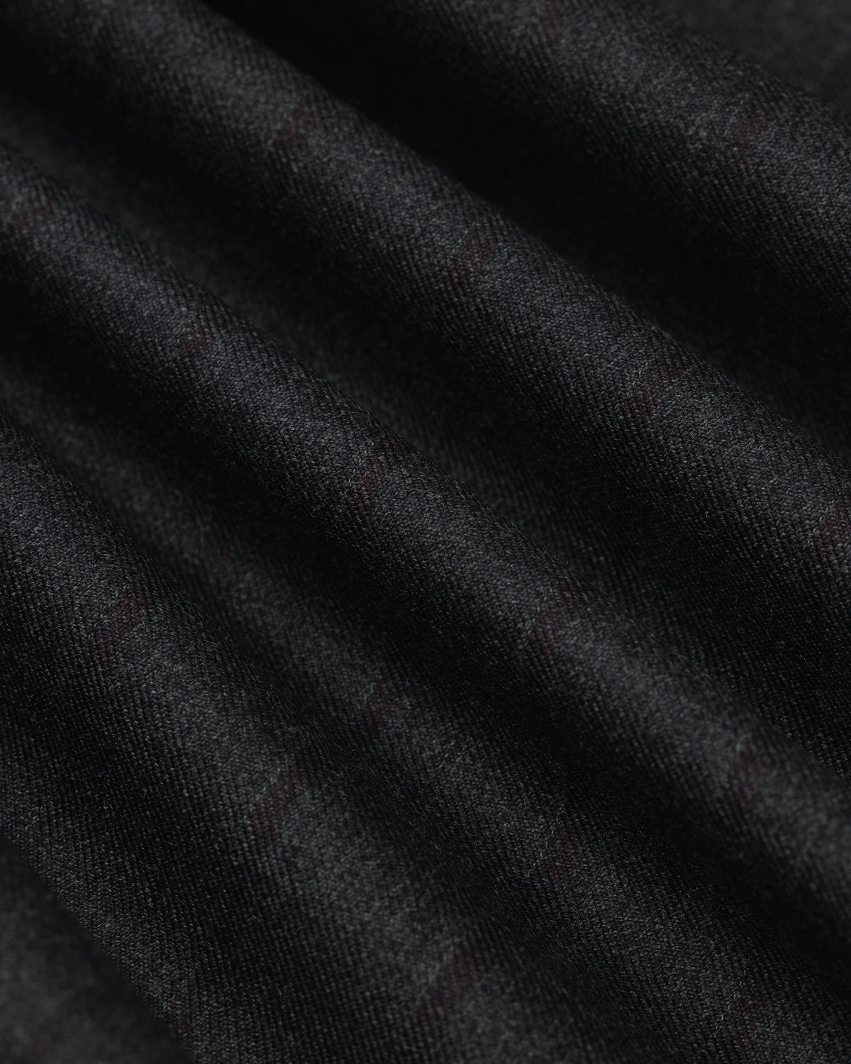 Collarless Striped Blazer in dark gray fabric with a subtle pinstripe pattern, shown in soft folds.