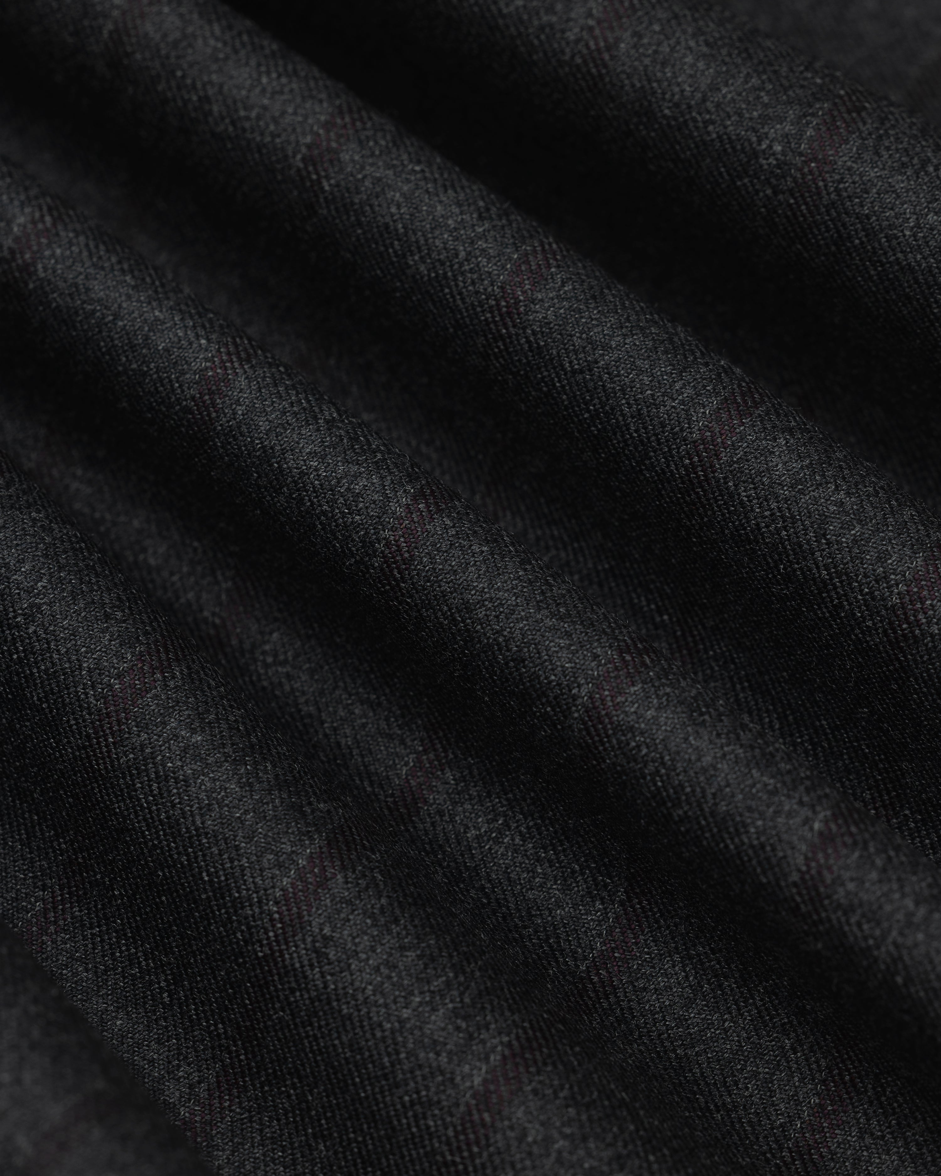 Collarless Striped Blazer in dark gray fabric with a subtle pinstripe pattern, shown in soft folds.