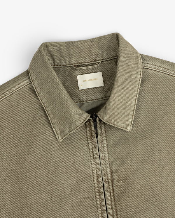 Flocked Denim Jacket in olive green, featuring a zip-up front, collared neckline, and a brand tag.