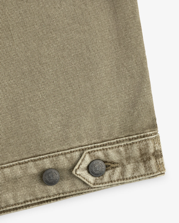Close-up of olive green Flocked Denim Jacket fabric featuring a buttoned tab at the hem.