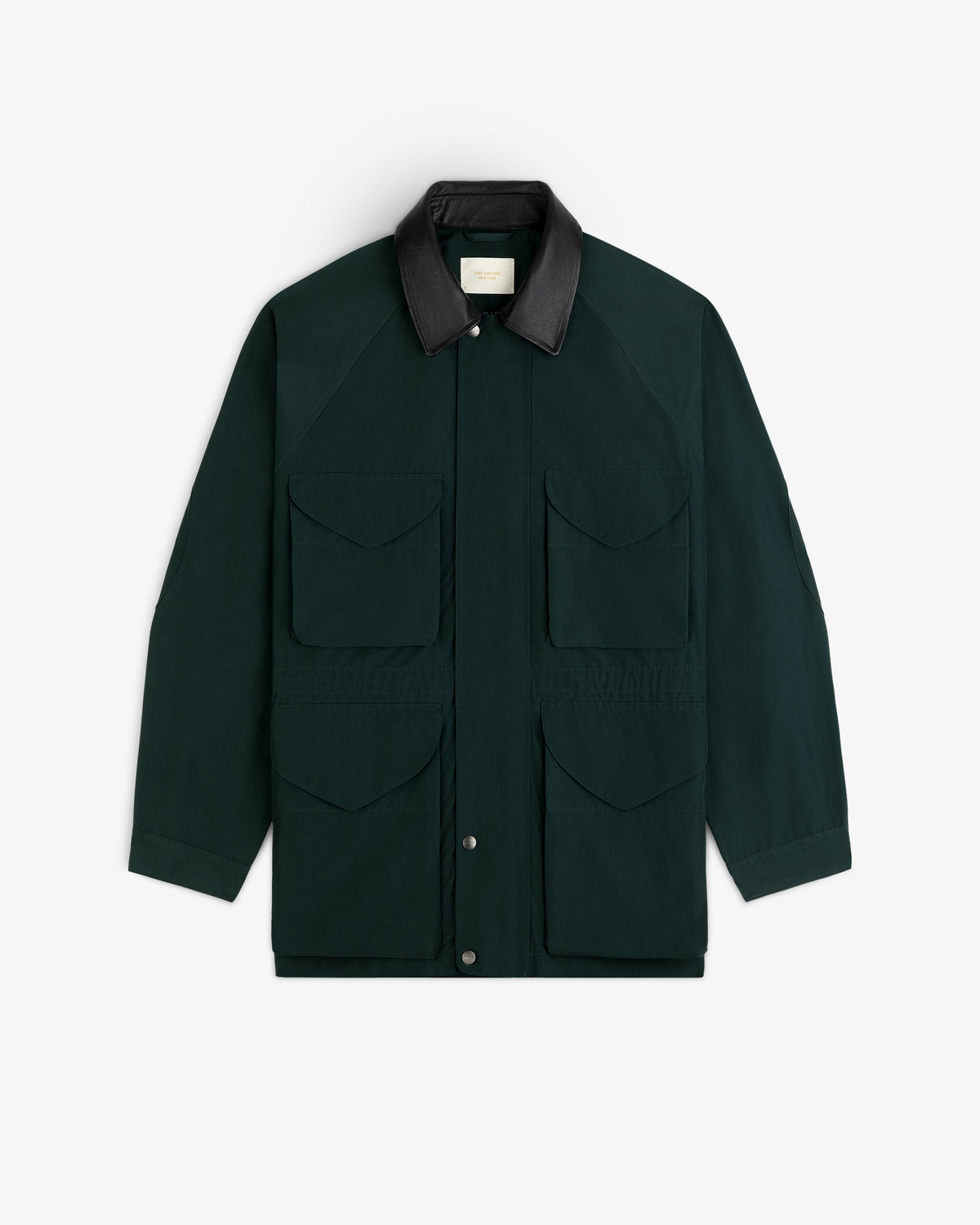 Lightweight Barn Jacket in dark green with four front pockets, black collar, shown on a white background.