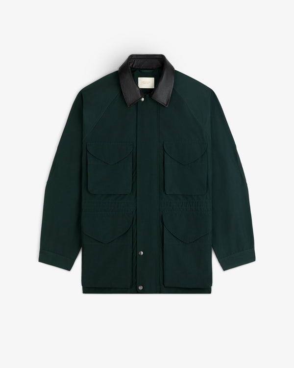 Lightweight Barn Jacket in dark green with four front pockets, black collar, shown on a white background.