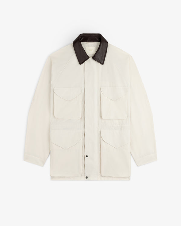 Lightweight Barn Jacket in ivory with four front pockets, black collar, shown on a white background.