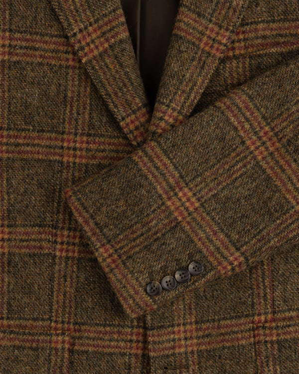 Close-up of a brown Single-Breasted Plaid Tweed Suit Jacket with four buttons on the sleeve cuff.