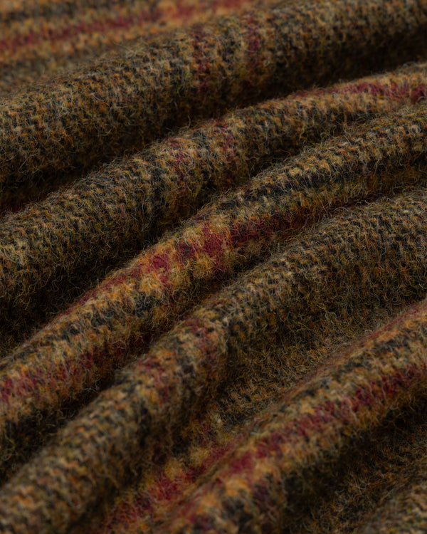 Close-up of a Single-Breasted Plaid Tweed Suit Jacket featuring a brown, green, and red textured plaid pattern.