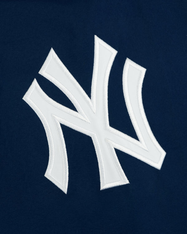 Yankees GORE-TEX Rain Delay Jacket with a white NY logo on dark blue, featuring the iconic team emblem.