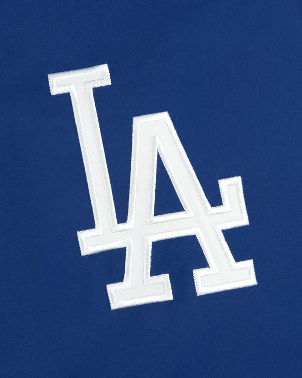 Dodgers GORE-TEX Rain Delay Jacket featuring a white LA logo on royal blue, inspired by the iconic team emblem.