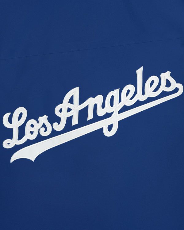 White ‘Los Angeles’ script on blue, inspired by a classic jersey. Dodgers GORE-TEX Rain Delay Jacket.