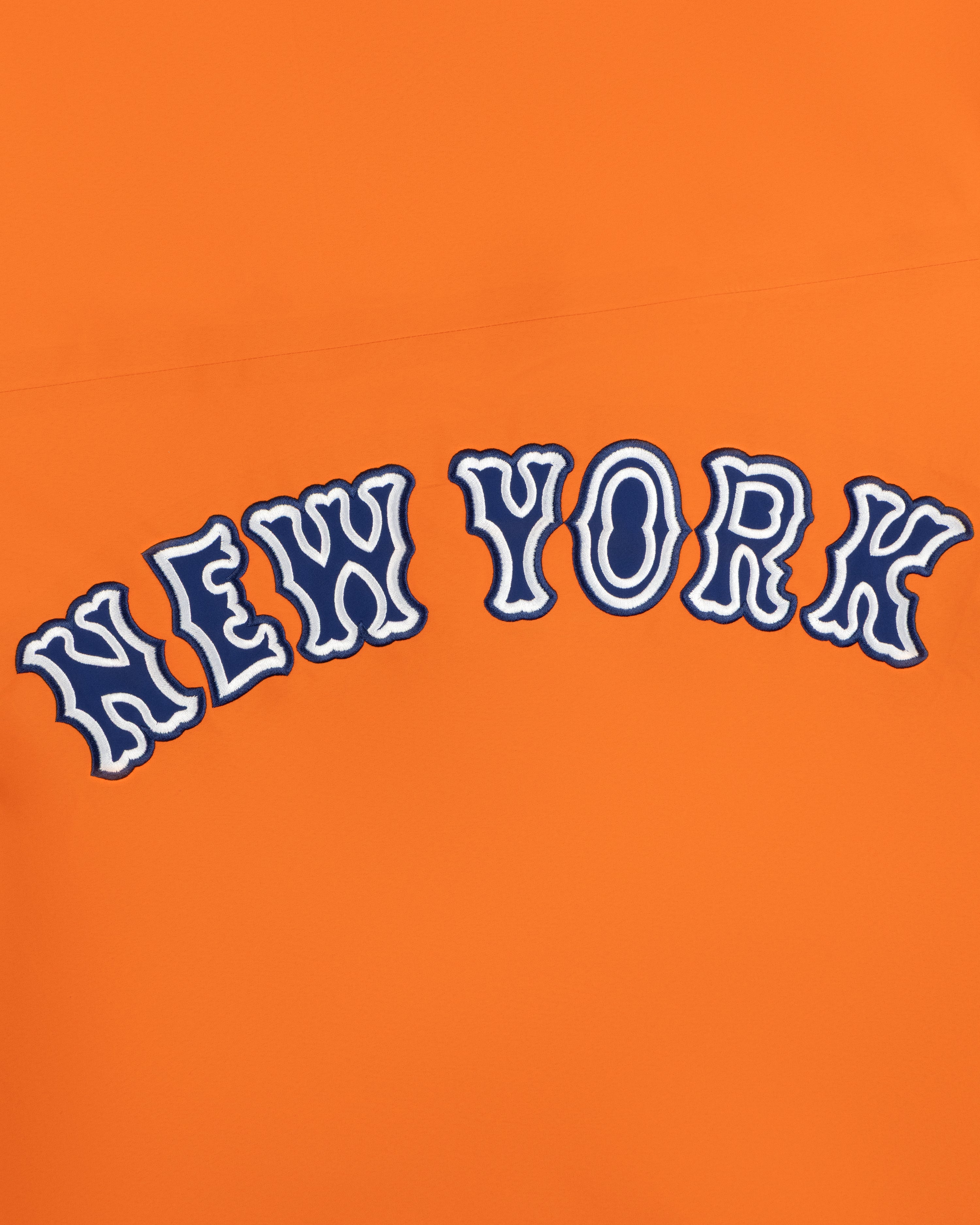 Mets GORE-TEX Rain Delay Jacket: “NEW YORK” in wavy blue & white letters on an orange background.