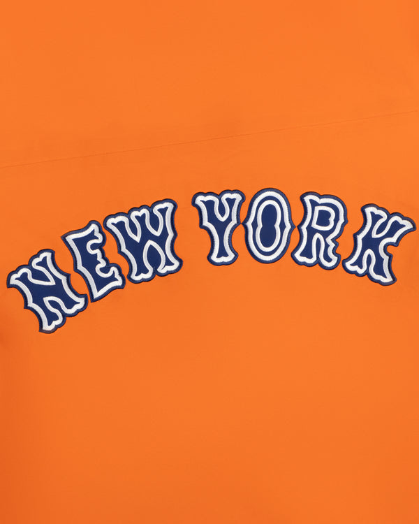 Mets GORE-TEX Rain Delay Jacket: “NEW YORK” in wavy blue & white letters on an orange background.