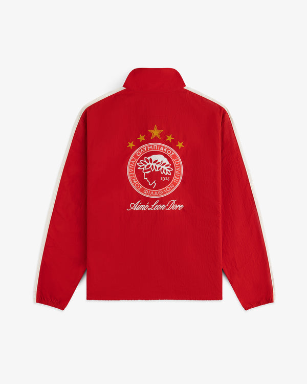 Red ALD / Olympiacos F.C. Nylon Quarter Zip Pullover with white side stripes and a team logo on the back.