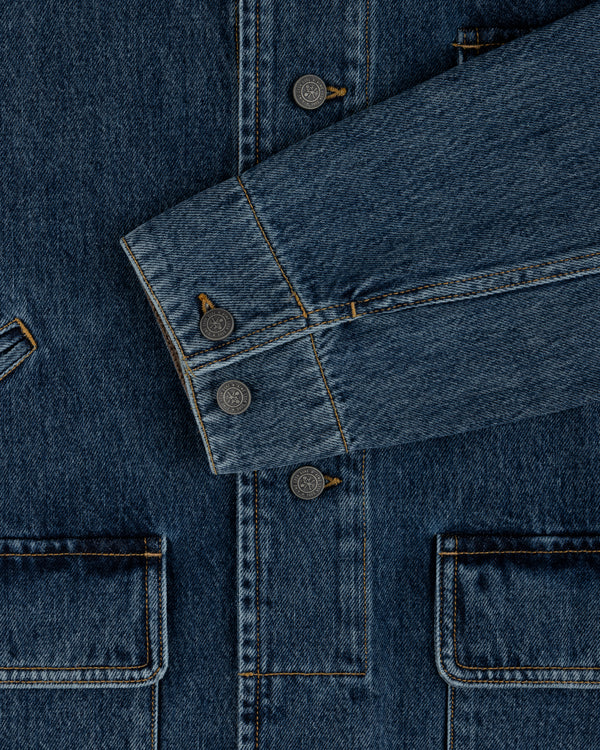 Blue Denim Chore Coat with front patch pockets and metal buttons.