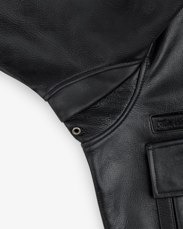 Close-up of the Napa Leather Bomber Jacket underarm and pocket, featuring a reinforced gusset with a metal grommet.