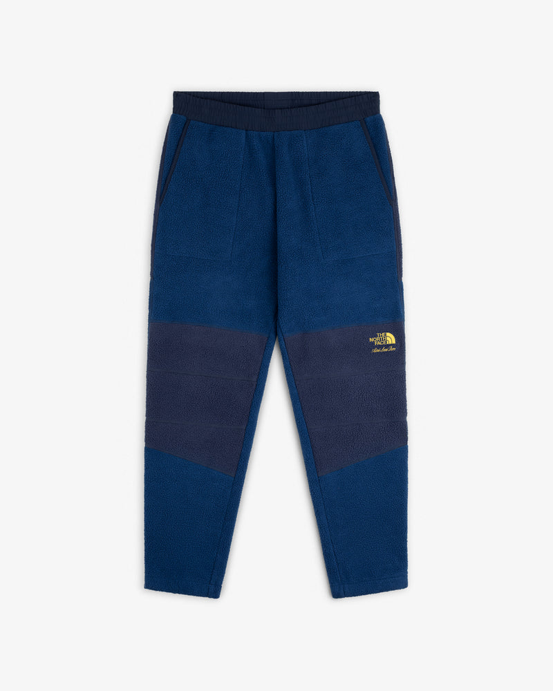 ALD / The North Face Denali Fleece Pant: Blue fleece, navy panels, elastic waist, pockets, yellow logo on left thigh.