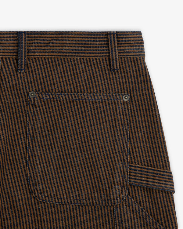 Close-up of Hickory Stripe Painter Pant with black stripes, a back pocket, and a waistband belt loop.