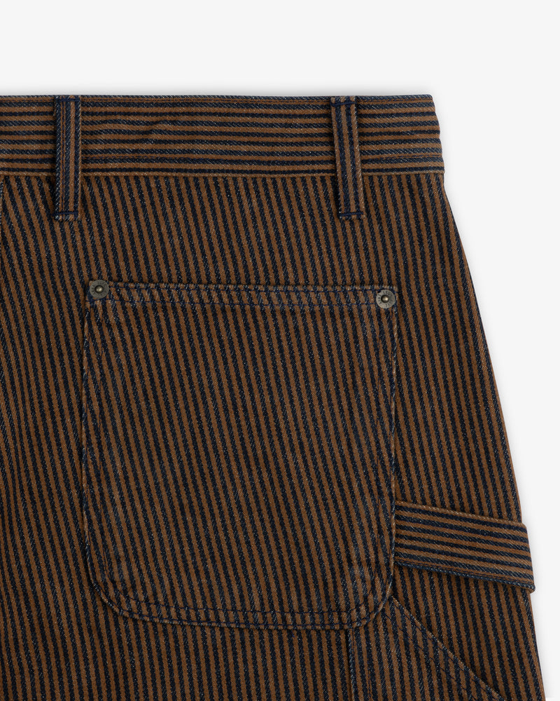 Close-up of Hickory Stripe Painter Pant with black stripes, a back pocket, and a waistband belt loop.