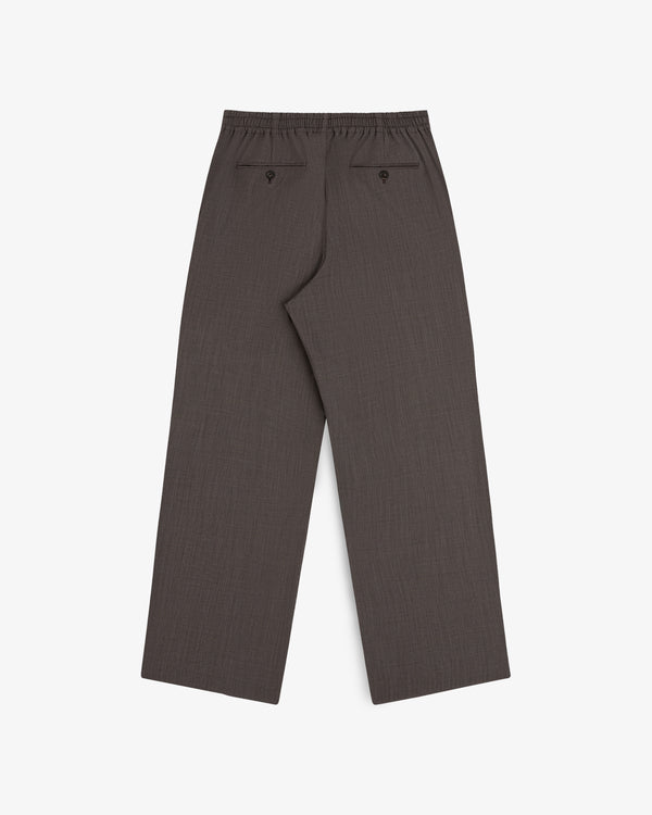 Houndstooth elasticated waist trousers with wide legs, laid flat on a white background.
