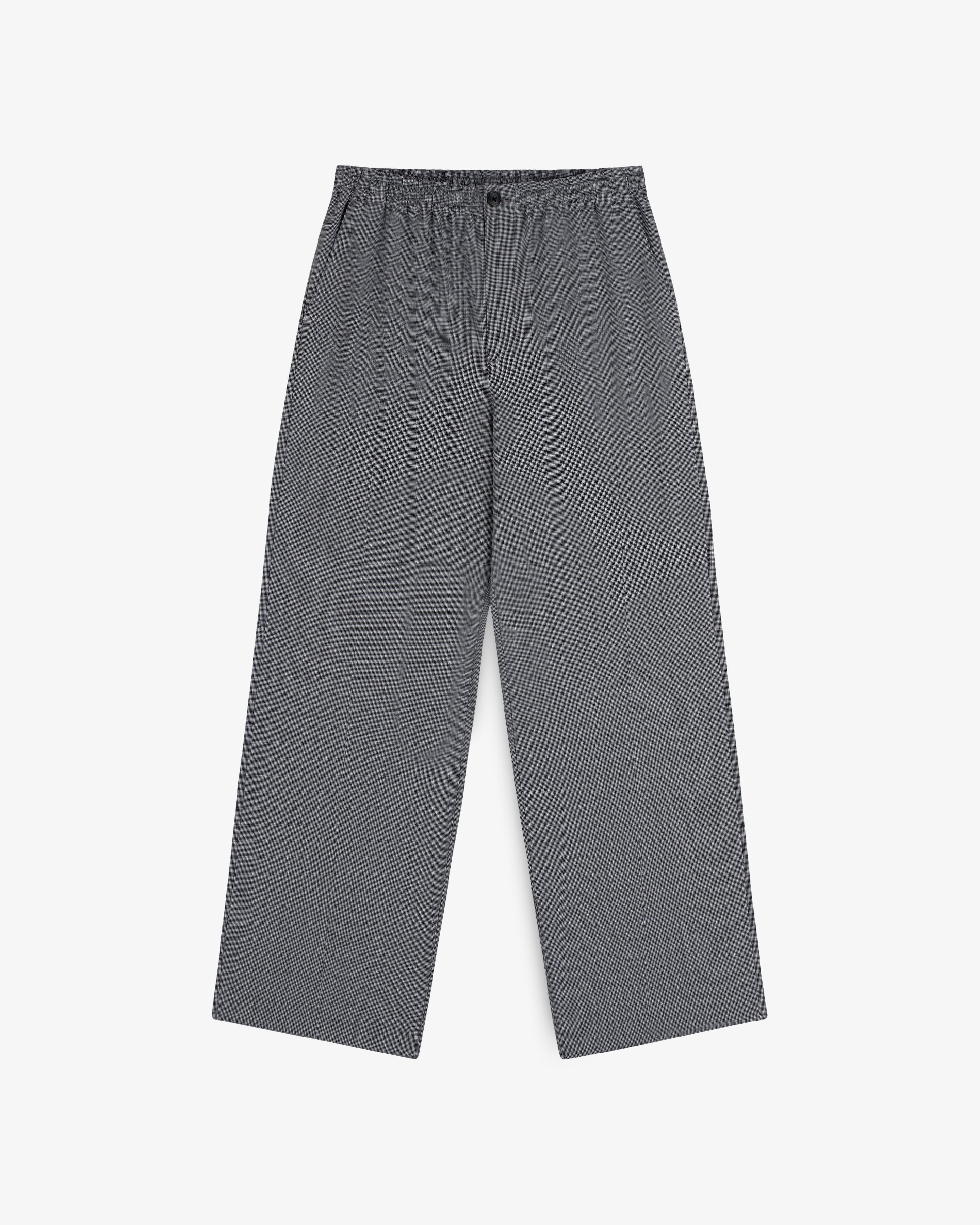 Houndstooth Elasticated Waist Trouser with wide legs, button closure, and side pockets on a white background.