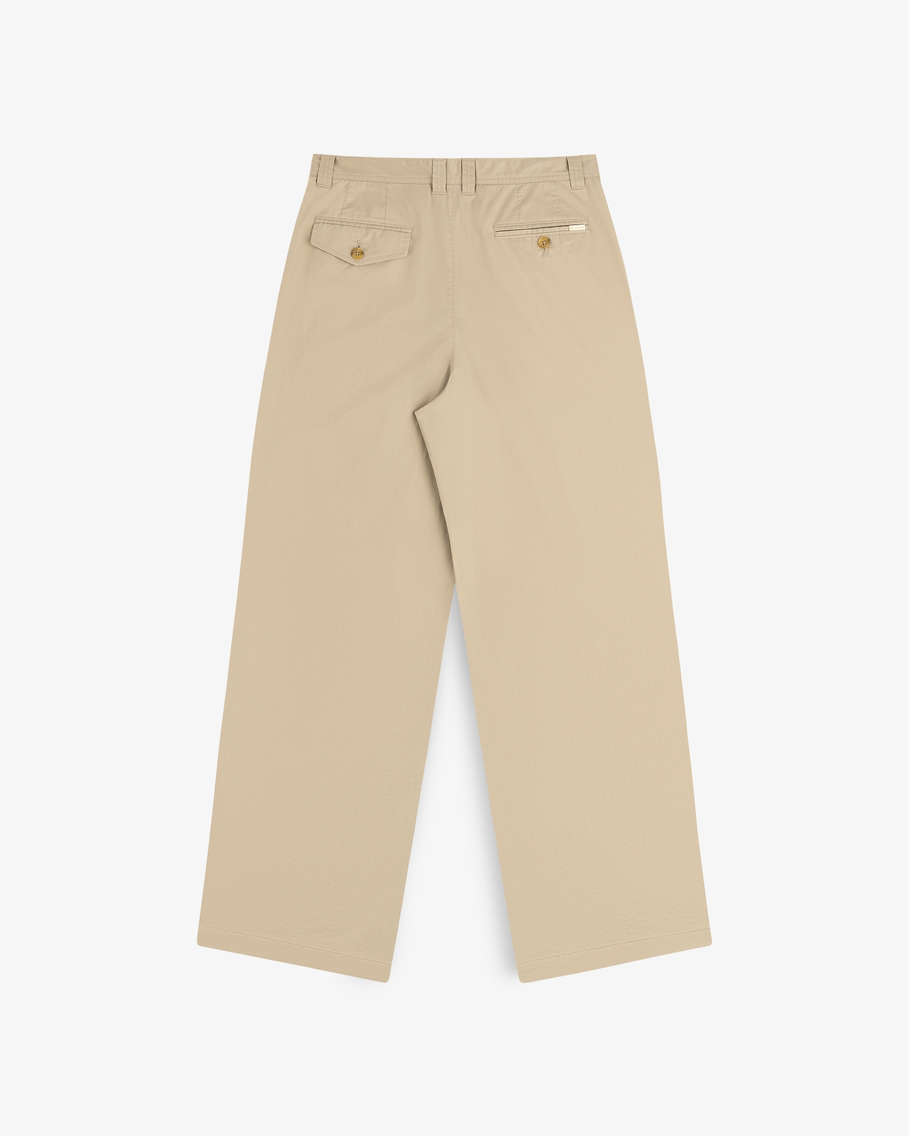 Double Pleated Officer Pant in beige, wide-leg, with two back buttoned pockets and a small white side tag.