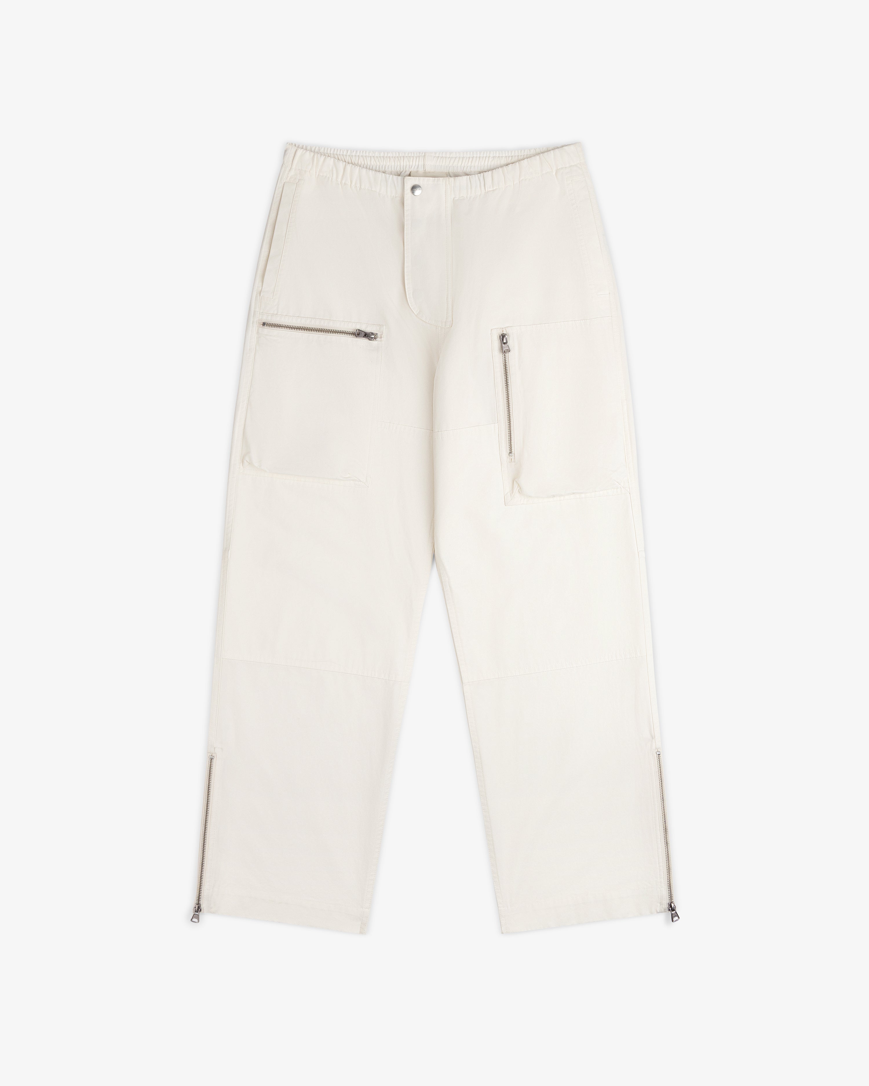 Garment Washed Aviator Pants in off-white with utility pockets and zippered leg openings.