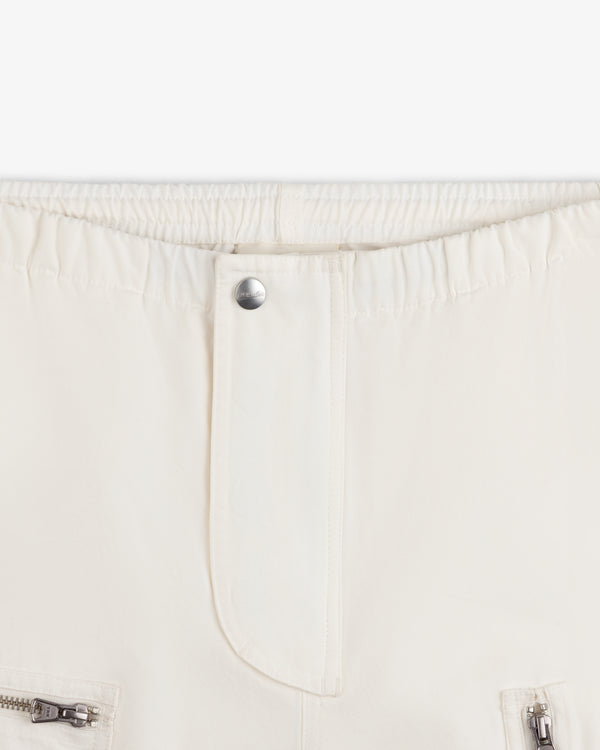 Garment Washed Aviator Pants in off-white with an elasticized waistband, center button closure, and zippered pockets.