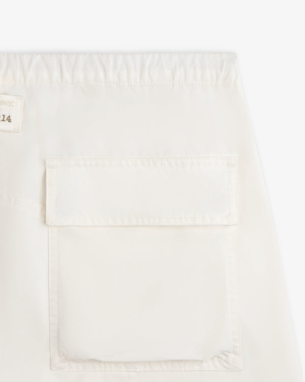 Garment Washed Aviator Pants in off-white with an elastic waistband and a large rectangular flap pocket.
