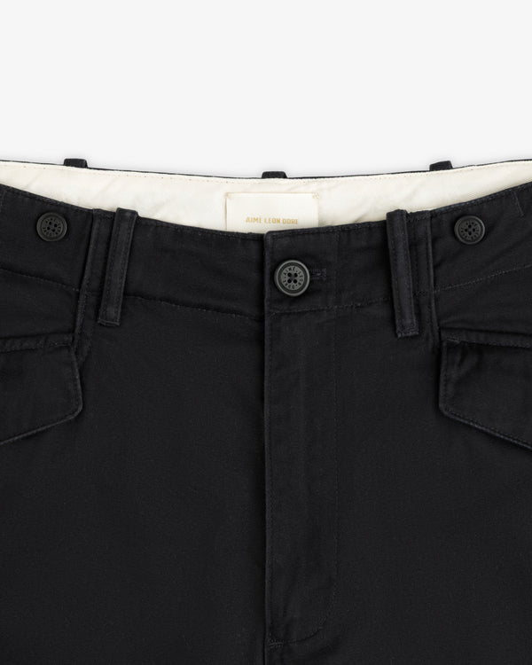 Close-up of the waistband, front buttons, and belt loops on the Fatigue Pant with visible stitching.