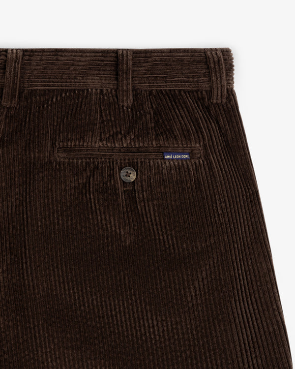 Dark brown Corduroy Trouser showing the back pocket, button closure, and a small brand tag.