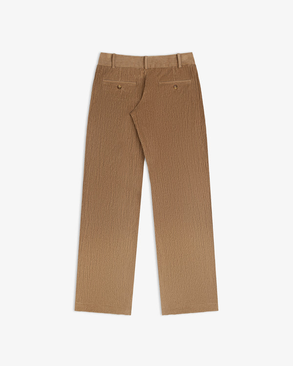 Back view of brown textured Double Pleated Corduroy Trouser with two buttoned welt pockets.