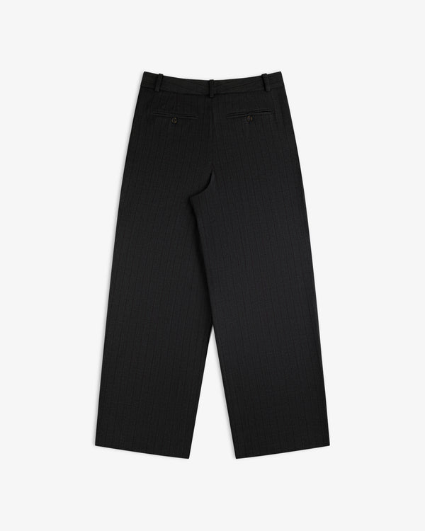 Back view of dark grey pinstriped Striped Double Pleated Suiting Trouser with double back pockets.