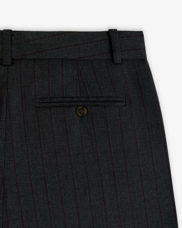 Striped Double Pleated Suiting Trouser in dark gray pinstripe with a single buttoned back pocket and belt loops.