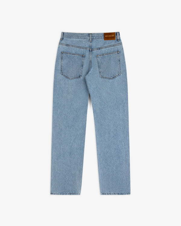 Back view of ALD Relaxed Fit Denim light-wash jeans featuring two back pockets and a leather waist patch.