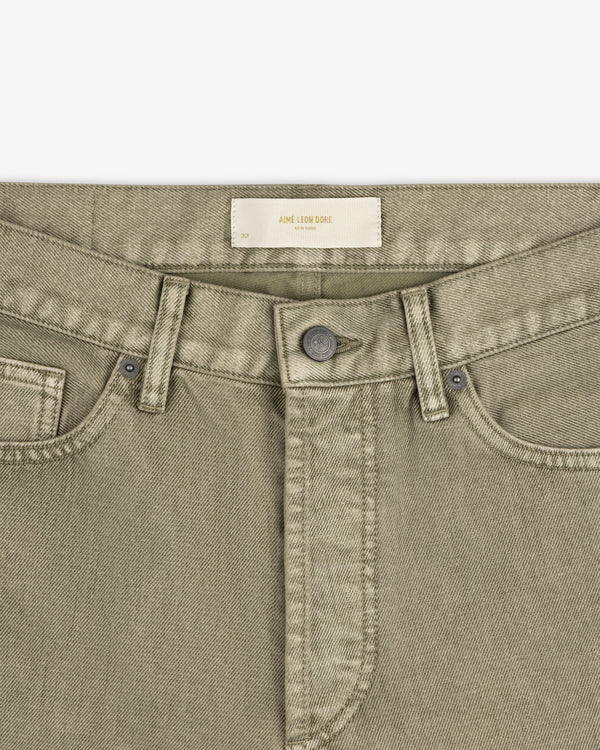 Flocked Straight Fit Denim pants in olive green with a button fly and a label at the waistband.