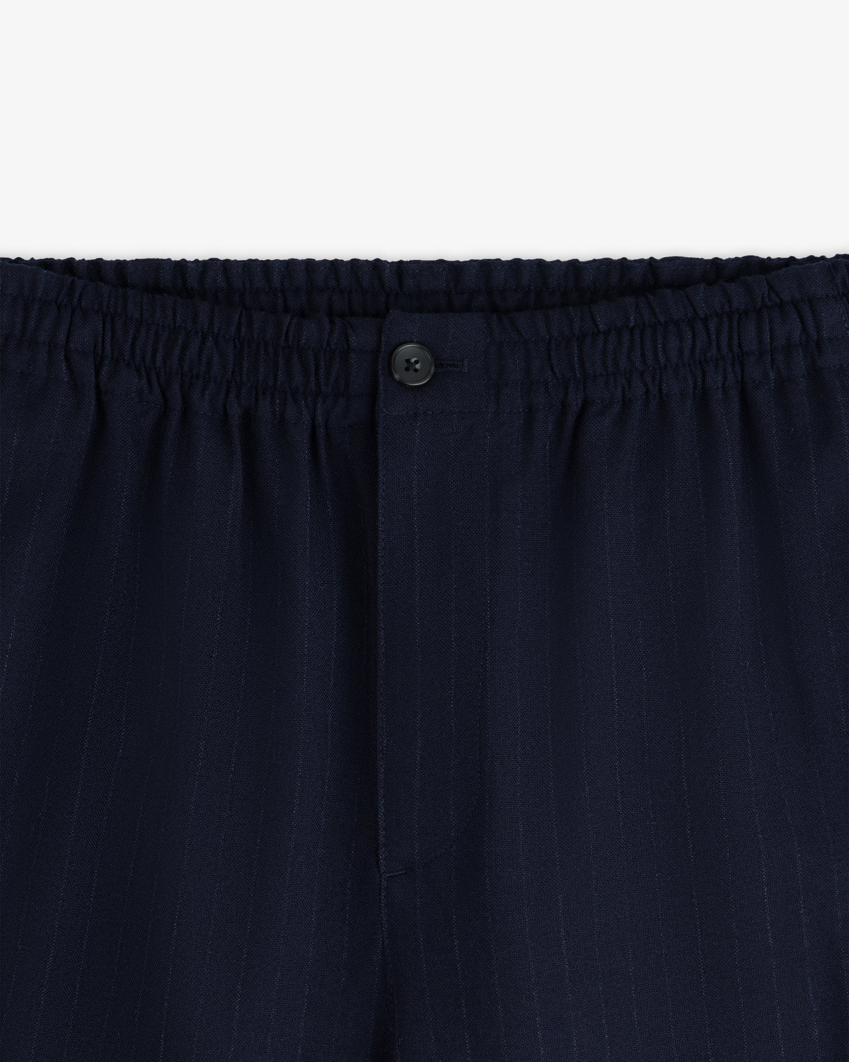 Wool Chalk Stripe Elasticated Waist Trouser in dark navy with an elasticated waistband and a single button closure.