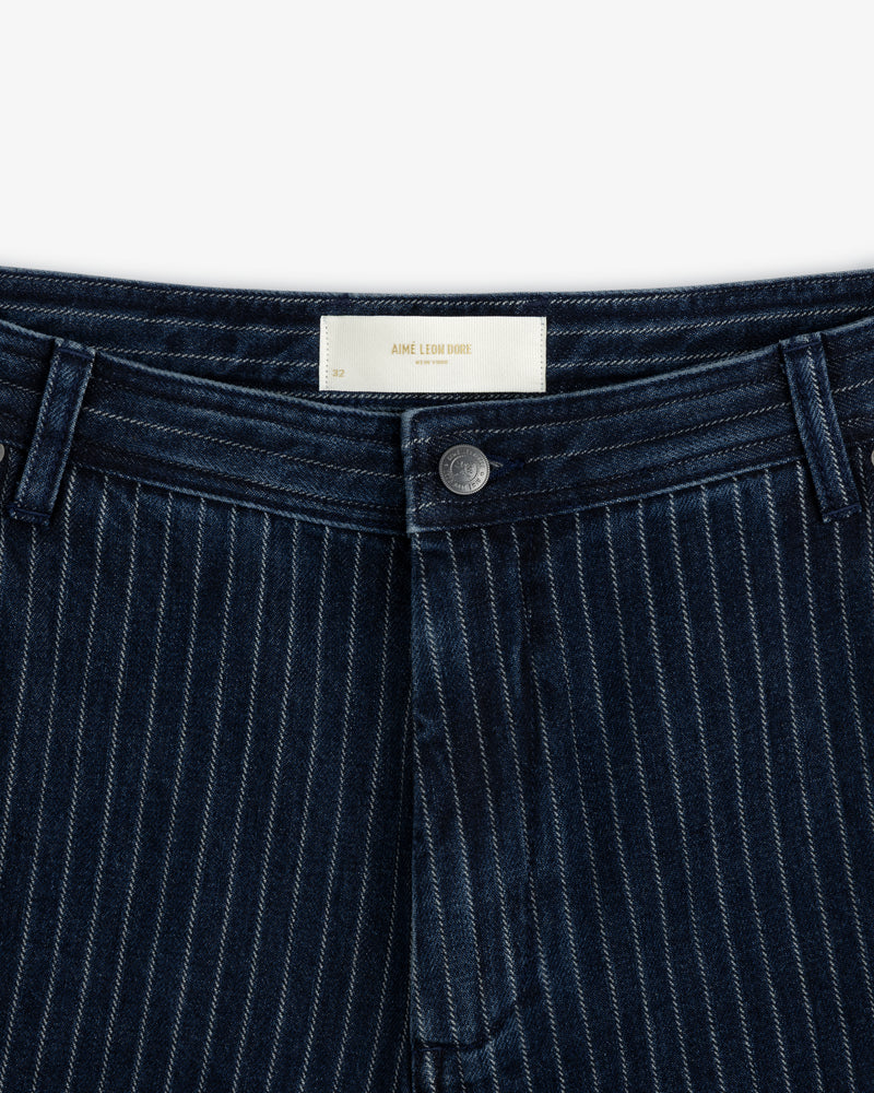 Close-up of the waist and fly of Chalk Stripe Painter Pant with a metal button and belt loops.