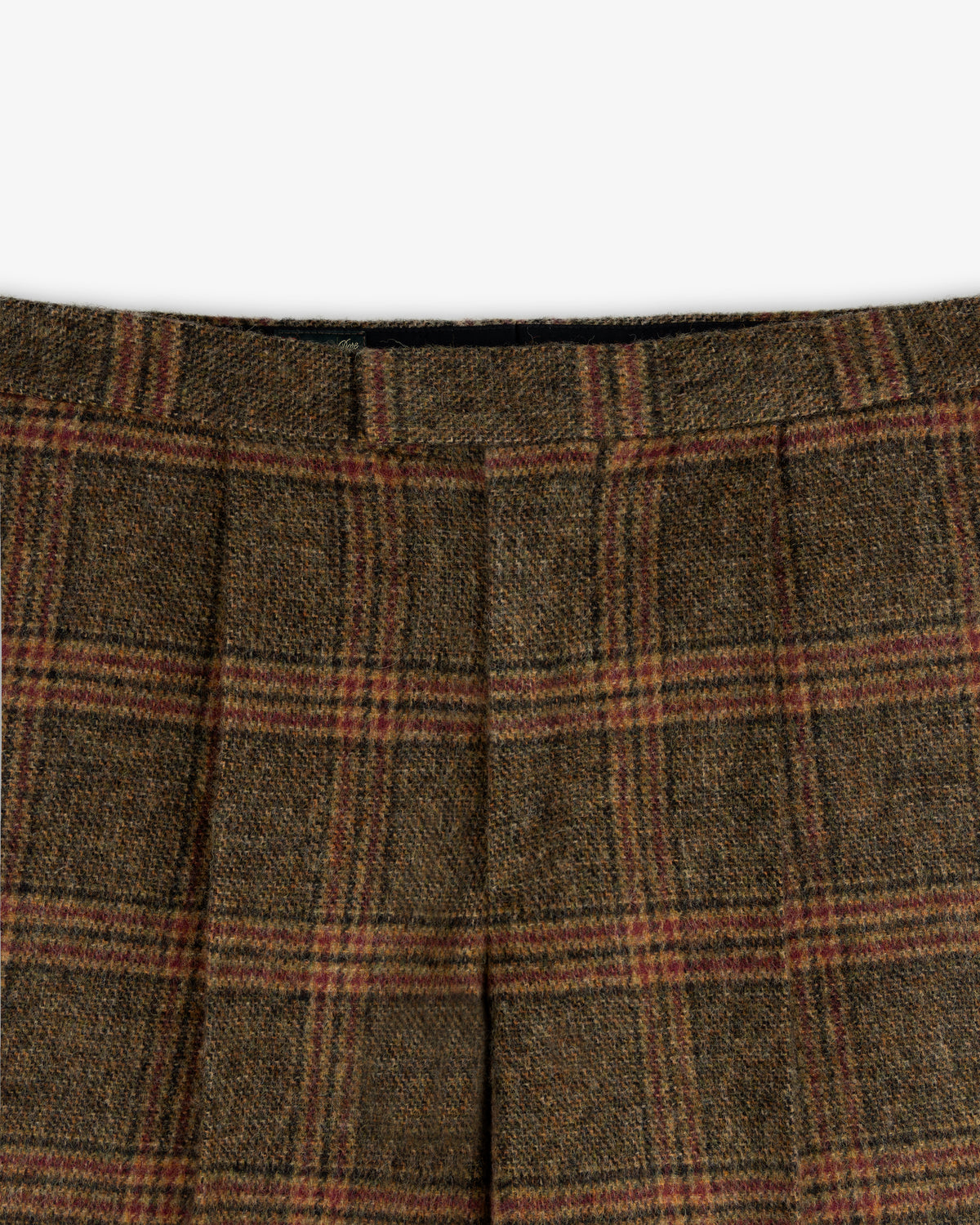 Plaid Tweed Suit Trouser in brown tweed with a dark plaid pattern, red accents, and a pleated waistband.