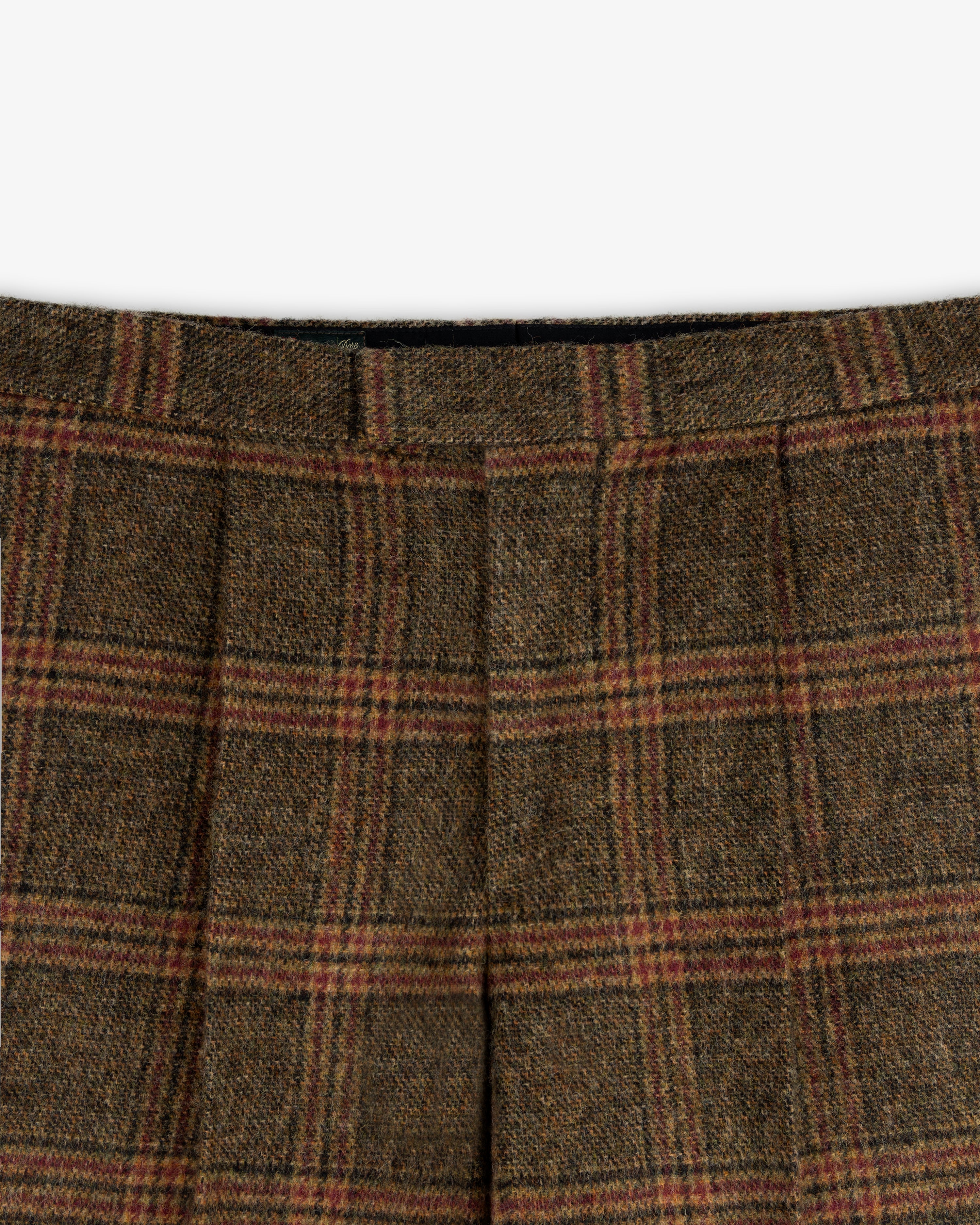 Plaid Tweed Suit Trouser in brown tweed with a dark plaid pattern, red accents, and a pleated waistband.