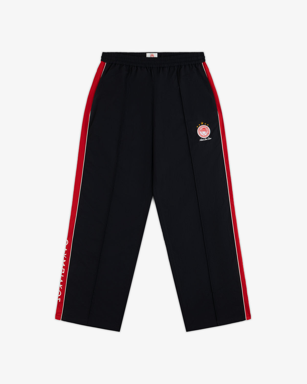 ALD / Olympiacos F.C. Nylon Track Pant in black with red and white side stripes, a circular sports emblem, and leg text.