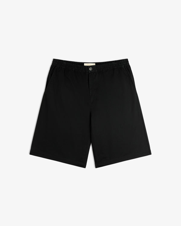 Cotton Casual Short: black, knee-length, elastic waistband, side pockets, button closure, laid flat on white.
