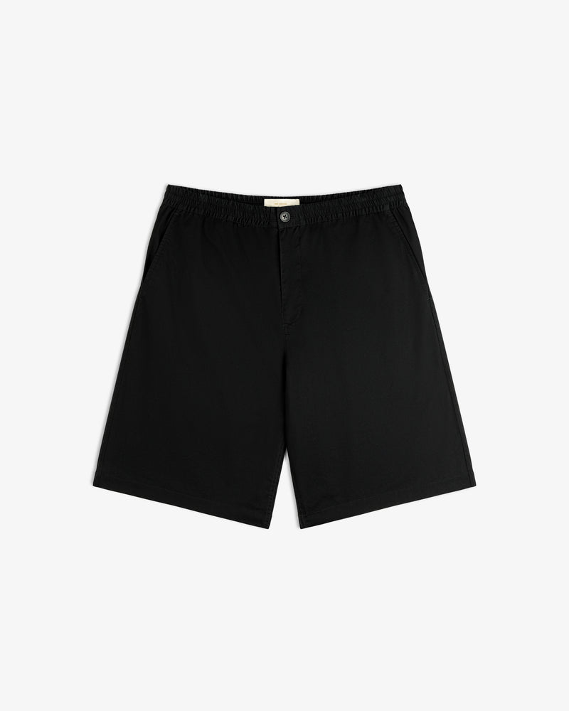 Cotton Casual Short: black, knee-length, elastic waistband, side pockets, button closure, laid flat on white.