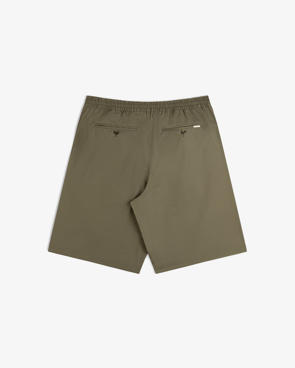 Back of Cotton Casual Short in olive green with elastic waist, two buttoned pockets, on white background.
