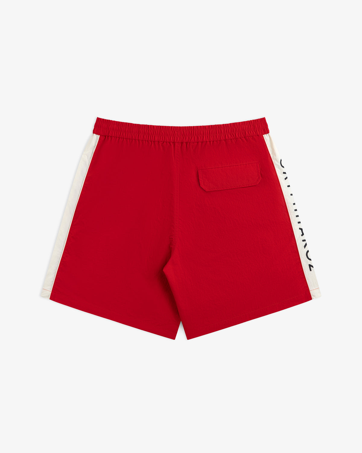 ALD / Olympiacos F.C. Nylon Training Short in red with white side panels and a back pocket.