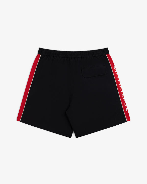 ALD / Olympiacos F.C. Nylon Training Short: black athletic shorts with red and white side stripes and a rear pocket.