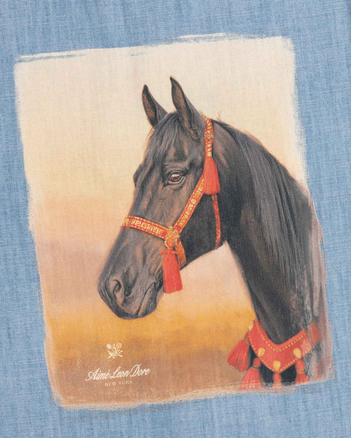 A Bayard Chambray Shirt in black with red-orange accents, displayed in profile on a textured blue background.