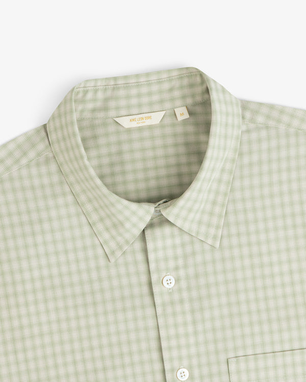 Plaid Casual Shirt in light green with collar, pocket, and white buttons, shown from top front angle.