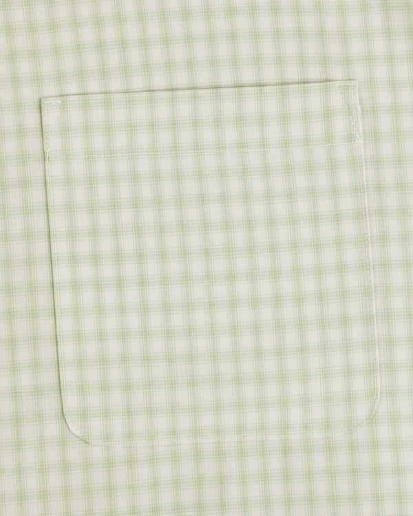 A close-up of the Plaid Casual Shirt’s light green and white pocket, featuring detailed visible stitching.
