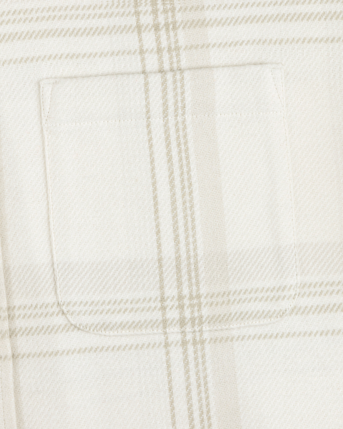 Close-up of a chest pocket on a cream and tan Yarn Dyed Plaid Overshirt.