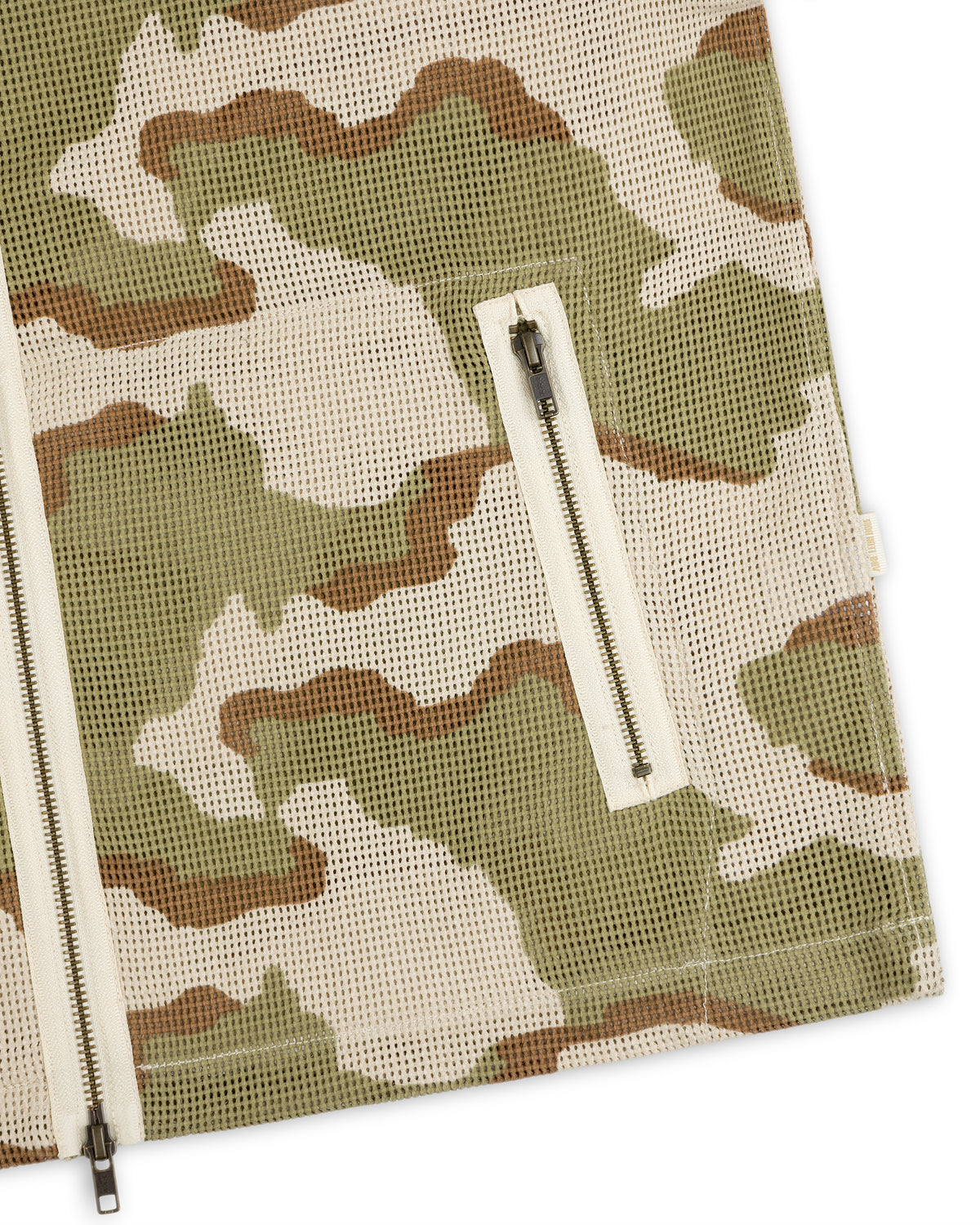 Camo Mesh Zip Overshirt featuring a camo-patterned mesh design, central full-length zipper, and side zippered pocket.